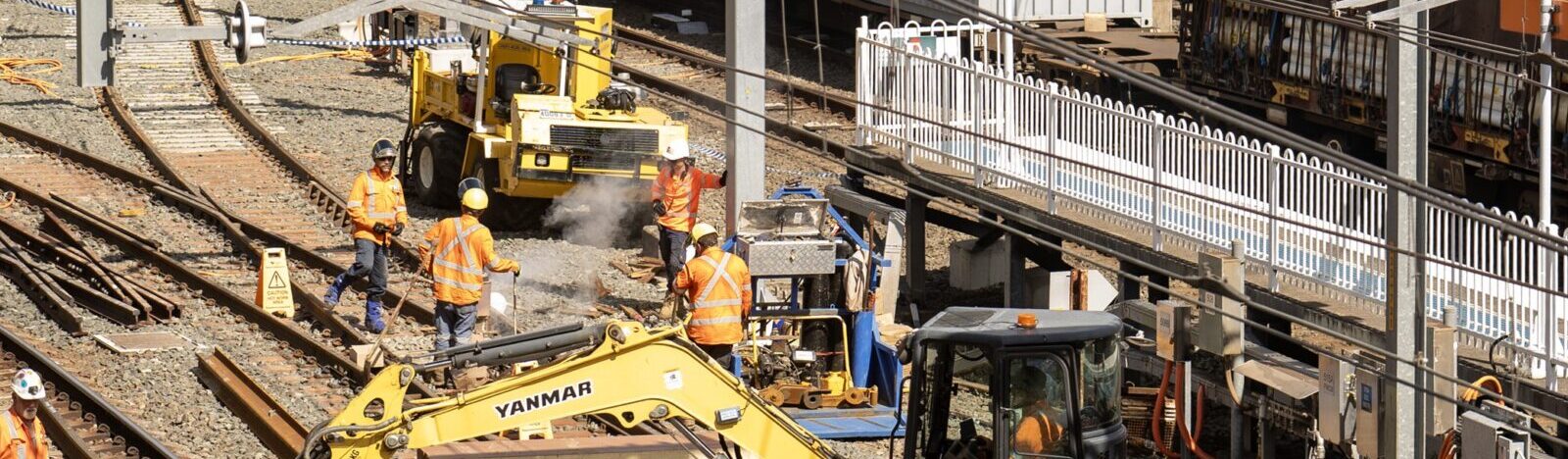 Construction site with real-time environmental monitoring for dust, noise, and vibration compliance